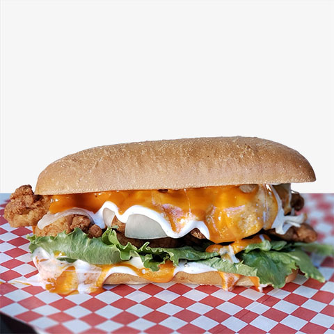 Sandwich with Golden Crispy Fried Chicken, Provolone Cheese, Lettuce, Buffalo Sauce, Ranch Dressing On Fresh Ciabatta Roll.