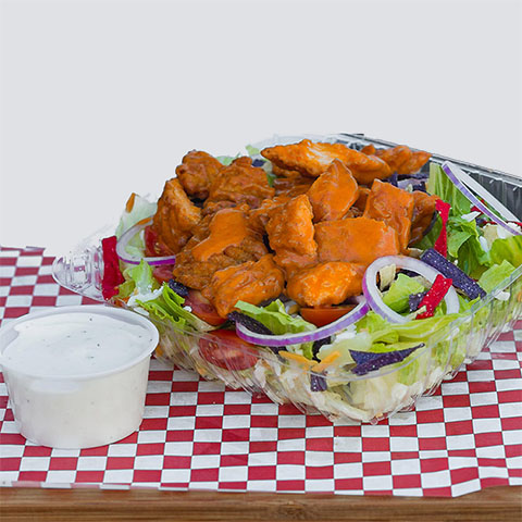Lettuce, Tomatoes, Red Onions, Shredded Cheese, Tortilla Strips, Fried Chicken Covered In Buffalo Sauce. Ranch Dressing Served On The Side